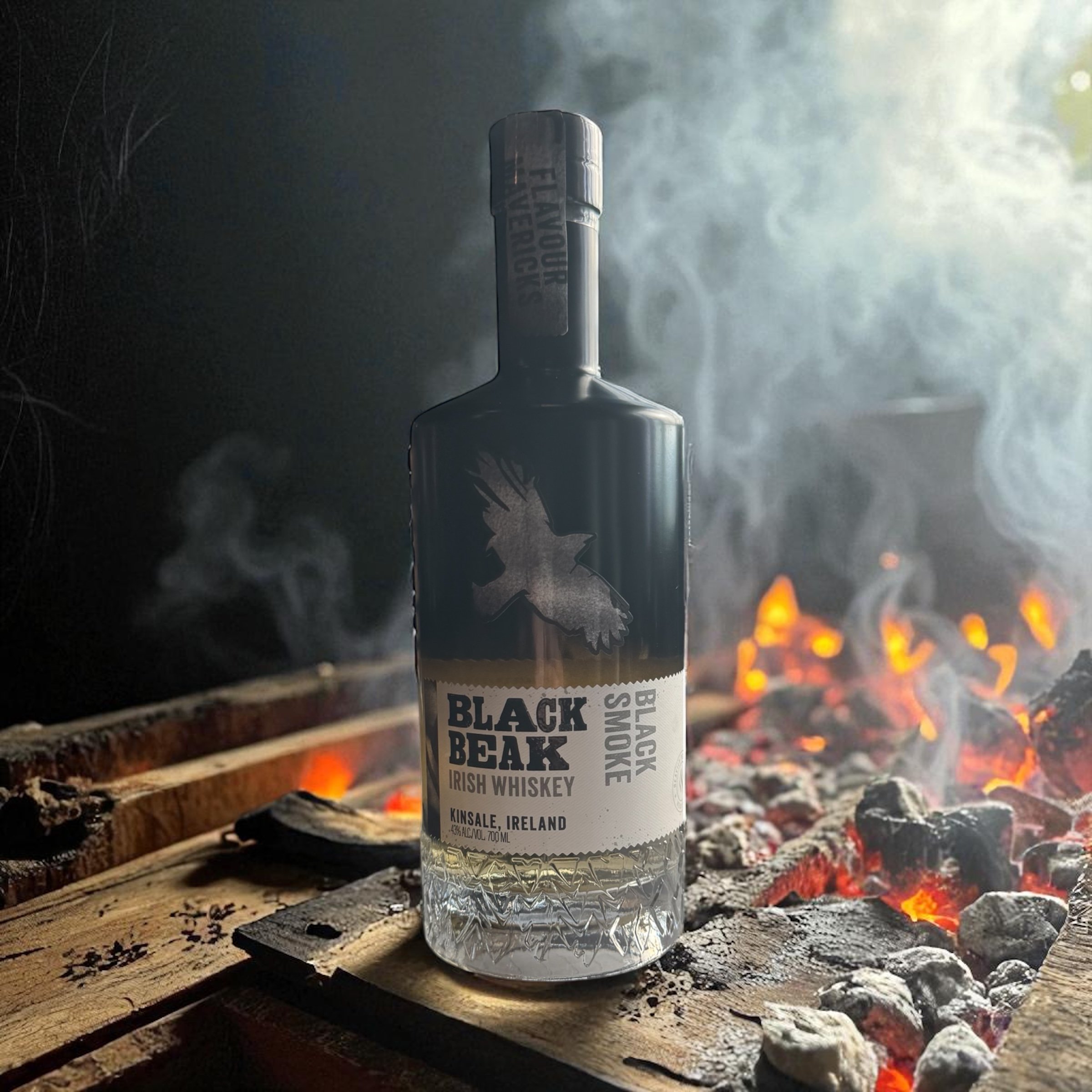 Photoroom_20251009_151424 Black Beak Irish Whiskey bottle amidst smoldering embers, enveloped in smoky ambiance, Kinsale, Ireland.